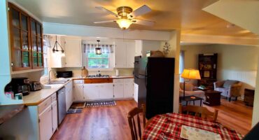 Farm House Cabin A Kitchen & Living Room